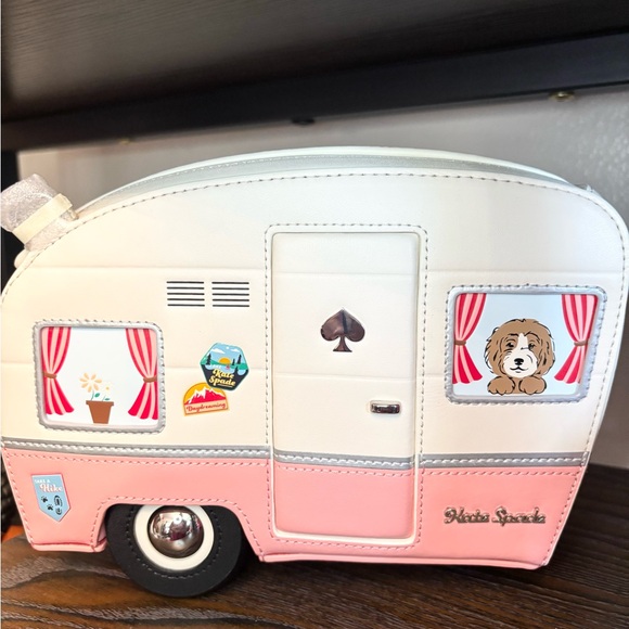kate spade Handbags - Kate Spade Rare Pink and White Camper Crossbody Bag
